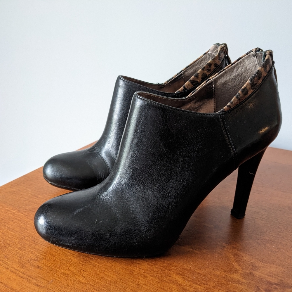 DKNY black booties with leopard detailing